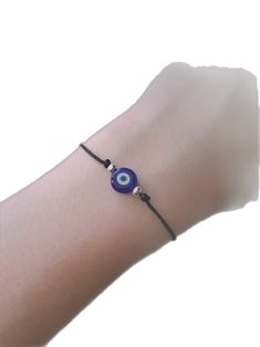 Spiritual Black Evil Eye Friendship Bracelets, Black Spiritual Friendship Bracelets With Evil Eye, Spiritual Black Friendship Bracelets With Evil Eye, Spiritual Black Friendship Bracelet With Evil Eye, Black Evil Eye Bracelet With Sliding Knot As Gift, Symbolic Evil Eye Bracelets As Gifts, Adjustable Round Spiritual Evil Eye Bracelet, Adjustable Hand Wrapped Evil Eye Bracelet, Adjustable Spiritual Evil Eye Bracelet