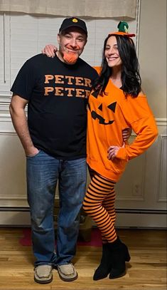 a man and woman dressed up in halloween costumes