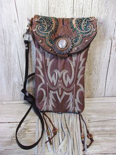 Cowboy Boot Crossbody Hipster Purse HP856 handcrafted from cowboy boots. Shop all unique leather western handbags, purses and totes at Chris Thompson Bags Boot Purse, Leather Fringe Handbag, Cowboy Boot Purse, Fringe Cowboy Boots, Hipster Purse, Custom Cowboy Boots, Western Bag, Modern Cowgirl, Hipster Bag