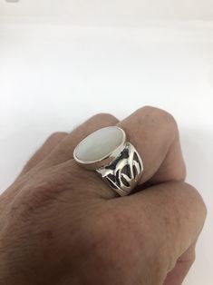 Lovely polished sterling silver has the look of Deco with a huge white Mother Of Pearl set in very detailed vintage filigree Size 7.5 We can size these with an additional $10-$20 fee for the jeweler All rings are shipped in a nice gift box. Check out our over a THOUSAND great reviews Engraving is $4 per letter and is not always perfect depending on the piece. It can take a few days if the jeweler is busy. This is payable to Paypal Judithsltd@gmail.com Pearl Set, Earrings Photo, 925 Sterling Silver Ring, Mother Of Pearl, Lovely Gift, Silver Fashion, Jewelry Art, My Jewellery, Sterling Silver Rings