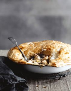 a chicken pot pie with a fork in it