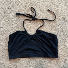 Black Nwot From A Smoke Free Home Offers Welcome! Casual Black Cropped Halter Top, Casual Black Stretch Halter Top, Casual Black Halter Crop Top, Black Cropped Halter Top For Beach, Black Crop Top For Spring Workout, Chic Black Cotton Halter Top, Casual Black Cotton Halter Top, Black Cotton Halter Top For Summer, Backless Halter Top