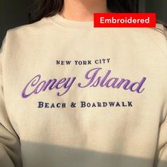 "*SIZES ARE UNISEX* -I'd suggest your usual size for a more fitted look, or sizing up for a more relaxed fit. *these sweatshirts are extra comfy when oversized \"New York City Coney Island Beach & Boardwalk\" embroidered on a comfy lightweight crewneck. The vintage-inspired design adds a touch of retro charm to any outfit, making it a standout piece for casual occasions, weekend getaways, or simply strolling along the shore. Pair it with your favorite jeans, shorts, or skirts for a laid-back yet Coney Island Beach, Minimal Shirt Design, T Shirt Press, City Sweatshirt, Beach Boardwalk, Coney Island, Outfit Making, Typography Quotes, Island Beach