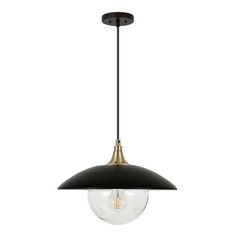 a black and gold pendant light hanging from the ceiling