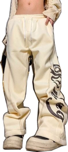 Retro Streetwear Pants For Fall, Beige Cargo Pants For Streetwear, Beige Wide Leg Sweatpants For Streetwear, Beige Wide-leg Sweatpants For Streetwear, Casual Beige Sweatpants For Streetwear, Vintage Streetwear Pants For Fall, Vintage Fall Streetwear Pants, Beige Spring Streetwear Sweatpants, Beige Sweatpants For Spring Streetwear