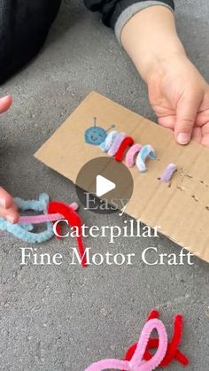 someone is making some crafts out of paper and yarn with the words caterpillar fine motor craft