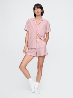 Soft cotton flannel pajama shirt and shorts set.  Notch collar, button front.  Short sleeves.  Patch pocket at chest.  Elasticized waist with drawcords at PJ shorts.  Allover print.  Note: This pajama set comes pre-wrapped and ready to gift for the holiday season.  Fit: Relaxed.  An easy silhouette throughout.  Models wearing Gap Cute Pajamas Shorts, Flannel Pjs, Red Pajamas, Pj Shorts, Candy Cane Stripes, Short Pj Set, Flannel Pajamas, Long Sleeve And Shorts, Matching Pajamas