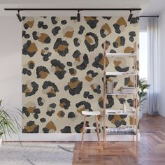 an animal print wall mural in a living room