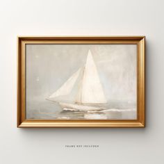 a white sailboat floating in the ocean on a foggy day with an inscription frame not included