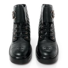 This is an authentic pair of CHANEL Shiny Calfskin Quilted Lace Up Combat Boots size 41 in Black. These chic combat boots are crafted of calfskin leather with quilted detailing on the side. They feature a 1.5-inch heel and 5-inch shaft, a sturdy black rubber base sole, and black laces. Lace Up Combat Boots, 5 Inch Heels, Black Laces, Black Rubber, Combat Boots, Calf Skin, Chanel, Lace Up, Thing 1