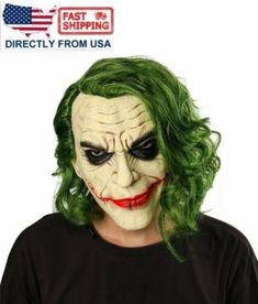 the joker mask has green hair and is wearing a black t - shirt with an american flag on it