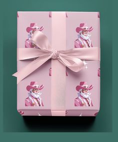 a pink gift box with santa claus on it