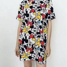 Zara Round Neck Short Sleeve Dress. Mickey Mouse Disney Print. Machine Wash Max. 30c/86f Delicate Cycle 100% Cotton Approx Measurements Laying Flat: Shoulders: 18.25" Pit To Pit: 20" Waist: 21" Length From Top Shoulder To Hem: 33" Casual Cotton Dresses With Character Print, Casual Summer Dress With Character Print, Playful Short Sleeve Dress With Graphic Print, Casual Summer Dresses With Cartoon Print, White Cartoon Print Dress For Spring, Disney Style Short Sleeve Spring Dresses, Spring Disney Short Sleeve Dresses, Multicolor Disney Dresses For Summer, Playful Short Sleeve Graphic Print Dress