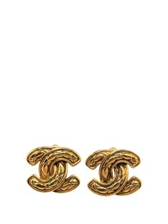 These earrings feature gold-plated body and clip-on closure. Gold. Condition: GOOD. This previously owned and used item is in good condition with minimal signs of use. This may include fading of material or plating and scratches. Due to the exclusivity of this item and its limited availability, processing and delivery might take longer than usual. Purchasing this item continues its narrative and reduces the environmental impact by avoiding the use of new resources needed to make the product from scratch, such as water, materials and electricity, and avoiding additional manufacturing impact. Learn more about what makes a product Conscious on our Conscious Criteria page. Costume Earrings, Shopping Chanel, City Dress, Chanel 2, Demi Fine Jewelry, Fine Watches, Summer Beach Wear, Fine Earrings, Ballet Flat Shoes