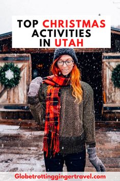 a woman with red hair and glasses in the snow wearing a scarf, hat and mittens