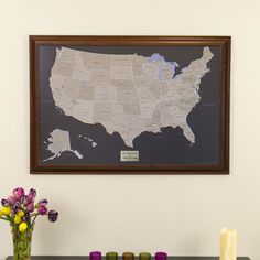 a framed map of the united states in brown and white, on a black background