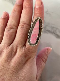 This large ring is a perfect statement piece. Created with polymer clay that was inspired by rose quartz, it's sealed with several layers of UV resin, and is extremely durable. The ring is hypoallergenic. Unique Hand Wrapped Pink Jewelry, Artisan Pink Ring As Gift, Unique Pink Rings With Large Stone, Fimo Ring, Polymer Clay Ring, Clay Ring, Stainless Steel Ring, Large Ring, Quartz Rose