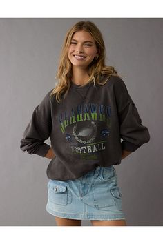 Super soft fleece/Crew neck/Seattle Seahawks graphics/Ribbed cuffs & hem Throwback Fan Gear Tops For Fall, Throwback Sports Season Tops With Ribbed Cuffs, Relaxed Fit Throwback Tops For Fall, College Style Sweatshirt With Ribbed Cuffs For Game Day, Throwback Sweatshirt With Ribbed Cuffs For Game Day, Throwback Fleece Sweatshirt For Fall, Nfl Game Day Outfit Woman Eagles, Seahawks Game Day Outfit, Seahawks Outfits Womens