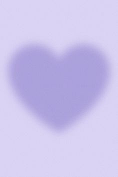 the shadow of a heart on a purple background