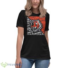 The Youth Cincinnati Bengals Black Divide 2023 Shirt is the ultimate fan gear for young football enthusiasts who bleed orange and black. Showcasing the iconic Bengals logo and colors, this shirt is a must-have for any young fan looking to support their favorite team in style and comfort. Constructed with utmost attention to detail, this shirt is made from high-quality materials that ensure durability and longevity. The soft and breathable fabric keeps young fans cool and comfortable during inten Bengals Logo, Orange Accents, The Youth, Cincinnati Bengals, Bold Black, Fan Gear, Kid Tees, Twill Tape, Workout Tee