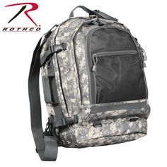 Rothco’s Move Out Tactical Travel Backpack is the ultimate solution for versatile and organized travel. Designed to be carried in 3 different ways—using the top carry handle, side carry handle, or adjustable shoulder straps with D-rings—this rugged backpack adapts to your needs. The large zippered back pouch allows the shoulder straps to be tucked away, fully converting the outdoor backpack into a travel bag. Its expansive zippered main compartment, complete with 2 interior adjustable tie-down s Military Bag, Military Backpack, Hold Hands, Tie Down Straps, Tactical Backpack, Outdoor Backpacks, Digital Camo, Quick Release Buckle, Emergency Kit