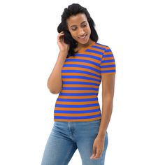 Introducing our Blue Orange Striped T-Shirt for Women, a must-have addition to your wardrobe! This stylish t-shirt is not only visually appealing with its vibrant blue and orange stripes, but it also offers exceptional comfort and durability. See more striped clothingCrafted from a high-quality cotton touch polyester jersey, this t-shirt feels incredibly smooth against your skin, ensuring a pleasant wearing experience all day long. The fabric is designed to retain its color even after multiple w Porto Rico, Costume Intero, Orange Shirt, Vibrant Blue, Retro Stil, Clothes Gift, Style Retro, Blue Orange, Blue Stripes