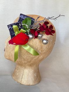 "Dress up your darling hair-do with this vintage-inspired Christmas fascinator adorned with bright Christmas cardinal bird, periwinkle crushed velvet ribbon, lime ribbon, silver berries and red glitter flowers.  Includes an alluring snowy glitter branch to add a little chic charm that will be sure to turn heads.  Inspired by my love of 1940's actresses who always were dressed to the 9's. I imagine wearing this to a coffee, afternoon tea or book club where the ladies get down to gossip,  gabbing and chisme while showing off their fabulous suits and dresses to each other. The alligator clip makes this adornment very versatile: it can be worn in any position on the head, or can even be attached to a blouse, bracelet, hat or worn as a corsage to bring more beauty to your day. Express your rega Christmas Fascinator, Flower Cottagecore, Periwinkle Purple, Vintage Inspired Christmas, Christmas Cardinals, Cardinal Bird, Glitter Flowers, Ribbon Flower, Bright Christmas