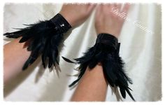 Black feather and Sequin cuffs.  Add a bit of pizzazz to any outfit, very comfortable to wear as they are fully lined in black felt. Size 6"- 7" wrist they Velcro to fit where you feel comfortable and are very easy to put on yourself. No awkward ties. Please ask any questions about the cuffs. Thanks Sally Gothic Black Costume Accessories As Gift, Black Fantasy Costume Accessories As Gift, Adjustable Handmade Black Costume Accessories, Handmade Black Costume Accessories, Handmade Black Costume Accessories For Festivals, Handmade Black Costume Accessories For Party, Adjustable Black Costume Accessories For Gift, Adjustable Black Costume Accessories As Gift, Handmade Black Fantasy Costume Accessories