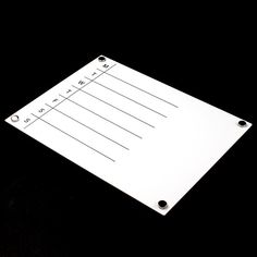 a close up of a white piece of paper on a black background with space for writing