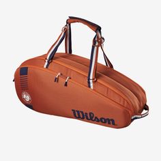 an orange duffel bag with the word moabu on it's side