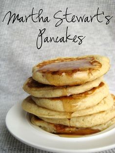 pancakes stacked on top of each other on a white plate with the words martha stewart's pancakes