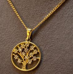 "14kGold Tree of Life Necklace ,curb chain ,18\" ,1.5mm, 3.11gr Premium spring ring for added safety! Priced to sell! Compare our prices to other similar sellers! Arrives in a GIFT BOX and includes FREE SHIPPING within the USA and Canada. International shipping is available at the most economical rates on ETSY. I HAVE BEEN IN THE JEWELRY BUSINESS ALL MY LIFE. I am a second -generation family member making gold and jewelry. Please feel free to ask me any questions - Always happy to help! Fast Rep Curb Chain Jewelry With Round Pendant For Gift, Curb Chain Round Pendant Jewelry Gift, Round Pendant Curb Chain Jewelry Gift, Curb Chain Pendant Necklaces For Anniversary, Yellow Gold Curb Chain Necklace For Anniversary, Yellow Gold Necklace With Curb Chain For Anniversary, Anniversary Yellow Gold Curb Chain Necklace, Anniversary Yellow Gold Necklace With Curb Chain, Gold Tree Of Life