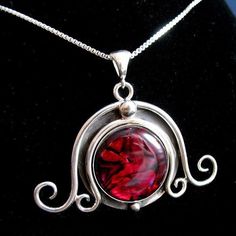 Inspired by art nouveau and bohemian magic, along with the ancient feel of the Celts, this design is hand-forged in sterling silver featuring a 20mm glowing red paua shell, as shown in the image, or you can choose from the drop down menu. The interior between the scroll work is antiqued for a contrasting effect of highly polished silver and an 'aged' effect. This piece is approximately 1.5 inches from top to bottom and 2 inches in width and forged from 12 guage sterling wire so it's got weight a Art Nouveau Jewelry With Artistic Design For Gift, Romantic Jewellery, Inspired Necklace, Paua Shell, Silver Art, Moon Pendant, Moon Necklace, Box Chain, Bling Bling