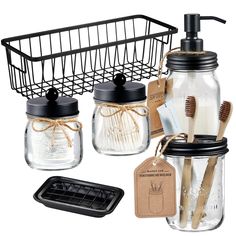 mason jar with toothbrushes and soap dispenser