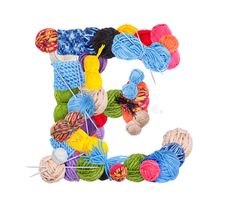 the letter e is made up of balls of yarn