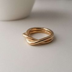 Close Up of the hypoallergenic & Waterproof Twist Ring from NAZ Parure. Twisted Gold Ring, Chloe Ring, Criss Cross Ring, Chunky Rings, Twist Ring, Hypoallergenic Jewelry, Cross Ring, Jewelry Lookbook, Color Ring