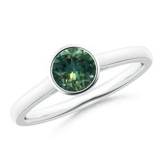 This solitaire ring crafted in platinum will enchant you with its minimalistic style. The round teal Montana sapphire is bezel-set on a polished plain shank. Montana Sapphire Ring, Sapphire Solitaire Ring, Sapphire Solitaire, Sapphire Rings, Montana Sapphire, Ring Crafts, Classic Ring, Bezel Setting, Solitaire Ring