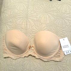 Beautiful Simone Perele Strapless Bra. New With Tags. Elegant Strapless Bra Partially Lined, Elegant Strapless Partially Lined Bra, Elegant Spring Stretch Bra, Elegant Strapless Bra For Spring, Demi Cup Bra, Half Cup Bra, Simone Perele, Nude Bra, Lace Set