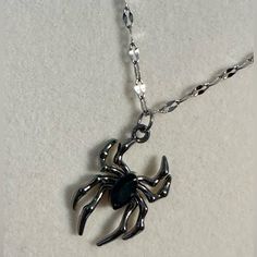 Black And Silver Tone Spider Charm On A Silver Tone Stainless Steel Chain. *Brand New. *Silver And Black Tone. *Stainless Steel Chain. *Aluminum Zinc Alloy Charm. *Unisex, Women, Men, Boys, Girls. Silver Jewelry For Halloween Alternative Fashion, Silver Emo Jewelry For Halloween, Gothic Stainless Steel Clavicle Chain Necklace, Nickel-free Silver Jewelry For Alternative Fashion, Punk Black Jewelry With Silver Chain, Alternative Fashion Silver Chain Jewelry, Silver Metal Necklace For Alternative Fashion, Edgy Sterling Silver Jewelry For Halloween, Gothic Stainless Steel Silver Chain Jewelry