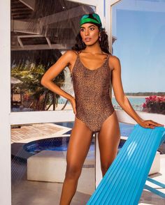 Description: Turn heads at the beach or pool with our Animal Print Polyamide Swimsuit, featuring a daring low-cut and exposed back. Crafted from high-quality polyamide, this swimsuit combines a bold animal print with a sophisticated silhouette, ensuring you make a stylish statement. Features:- Premium polyamide fabric for a smooth, durable, and comfortable fit- Bold animal print for a trendy and eye-catching look- Low-cut back for a daring and elegant design- Exposed back adds a chic and sensual