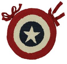 the captain's shield rug is red, white and blue with a star on it