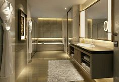 a bathroom with a large mirror, sink and bathtub next to a walk in shower