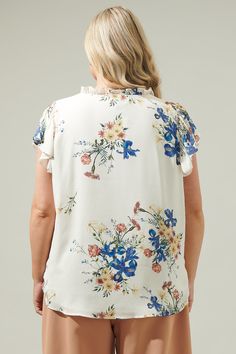 Keep it chic and easy in the Jacinta Floral Flutter Sleeve Blouse! Short flutter sleeves shape this trendy blouse featuring a deep surplice neckline, ruffles, and a fitted bodice. Just add denim and you'll be looking cute in no time!- Split neck- Flutter sleeves- Ruffle trim- Blouse- Color: Cream MultiSize + Fit - Model is 5'9" and wearing size 2X- Measurements taken from size 2X- Chest: 27"- Length: 28 1/2" Fabric Self:100% Polyester Lining:97% Polyester 3% Spandex Style Number STT17206PX Flutter Sleeve Blouse, Trendy Blouse, Trendy Blouses, Surplice Neckline, Holiday Weekend, Flutter Sleeves, Fitted Bodice, No Time, Ruffle Trim