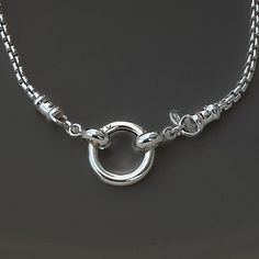 Stylish and versatile, this sterling silver rounded box chain necklace boasts a front circle clasp, ideal for interchangeable charms and pendants. Chain: Solid 925 Italian Sterling Silver Rounded Box Chain Necklace, 2.5mm width Clasp: Solid 925 Sterling Silver 14.5mm Hinged Round Push Clasp, ideal for interchangeable pendants and charms Ships within one business day  Free USPS First Class shipping in the USA  Comes wrapped as shown in photos Take a look inside my store:  https://www.etsy.com/sho Sterling Silver Round Box Chain Necklace, Sterling Silver Chain Necklace With Lobster Clasp, Sterling Silver Chain Necklace With Spring Ring Clasp, Silver Chain Necklace With Round Box Pendant, Silver Box Chain Necklace With Round Pendant, Silver Box Chain Necklace, Box Chain Necklace, Round Box, Box Chain