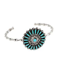 Chaco Canyon Sterling Silver Turquoise Zuni Flower Cuff Vibrant Kingman turquoise forms the petals of this pretty cuff. Worn solo or stacked, it's a fresh pick for your jewelry collection.        Approx. 6"L x 1-1/4"W; fits 5-1/4" to 6" wrist     Stamped .925 sterling silver; oxidized finish     Designed and Crafted in the USA   Stone Information       All sizes and weights approximate     Stabilized Kingman Turquoise - Round (4mm), rectangular (1x5mm to 1x6mm) Spring Turquoise Bracelet Jewelry, Spring Turquoise Jewelry Bracelet, Chaco Canyon, Flower Cuff, Southwest Jewelry, Country Fashion, Kingman Turquoise, Silver Turquoise, Turquoise Sterling Silver