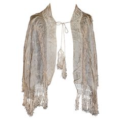 Cream silk. Hand embroidered with a floral motif. Hand knotted silk fringe. Hanging braided tassels on back. Tassels add 5" to length and width. Braided Tassels, Color Crema, Wedding Shawl, Embroidered Wedding, Cream Silk, Embroidered Silk, Floral Motif, Hand Embroidered, Hand Knotted