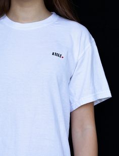 Show Ateez some love with this custom designed and embroidered 100% cotton t-shirt! Amazing quality and super soft for all your Kpop endeavors :) Support Ateez by repping their name! ⇨FIT This style is a unisex, boyfriend fit Tshirt. I recommend ordering what size you would typically buy in a standard Tshirt.   ⇨TSHIRT Each Tshirt is embroidered to order, bagged, sealed, and then shipped to you. ⇨SHIPPING All domestic shipping is free and included in the price. International shipping will be cal Custom Embroidered Cotton T-shirt For Streetwear, Custom Embroidered Cotton Tops For Streetwear, Trendy Embroidered Logo T-shirt For Summer, Trendy Cotton T-shirt With Custom Embroidery, Trendy Summer T-shirt With Embroidered Logo, Cotton T-shirt With Custom Embroidery For Streetwear, Trendy Custom Embroidery Tops For Streetwear, White Embroidered T-shirt, White Embroidered T-shirt For Everyday