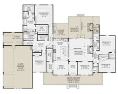 the first floor plan for a home with two master suites and an open concept kitchen