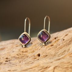 Stella Drop Earrings in Amethyst. Lovely, deep purple, translucent Amethyst drop Earrings with simple .925 sterling silver detailing. These are wonderful Amethyst drop earrings - easy to pop in and out and the bright, purple color of Amethyst pops! Stella drop Earrings are new at LBJ -- but soon to be a favorite! And we couldn't love them more than here in this fabulous, super-rich, purple amethyst. Modern and traditional at the same time! Minimal amethyst earrings with few embellishments except Blue Chalcedony Ring, Kyanite Earrings, Peridot Earrings, Red Pendants, Super Rich, Jasper Earrings, Earrings Purple, Rich Purple, Amethyst Jewelry