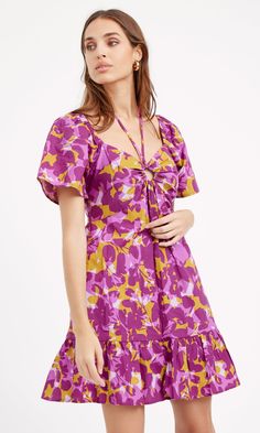 In a purple, floral flair, take this dress with you for a fun, casual date. The most noticeable feature is the O-ring detail on the neckline, attached in a halter-style design. Mini dress Flutter sleeves O-ring front Halter tie Length: 34" Chest: 17" Waist: 15" Self: 100% Cotton Lining: 100% Rayon Hand wash cold water with similar colors. Hang dry. Low iron, or dry clean Model is wearing a size small Style #: G237D5526 Dress Flutter Sleeves, Tie Length, Luxury Women Fashion, Casual Date, Halter Style, Flutter Sleeves, Purple Floral, Luxury Fabrics, Xl Dress